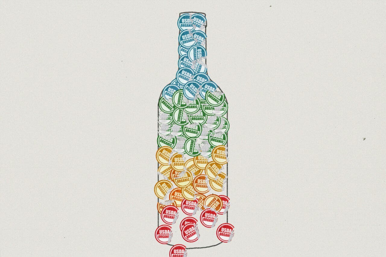 An illustration of a wine bottle made up of ripped up usda bottles