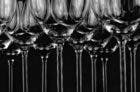 Wine glasses on a black background.